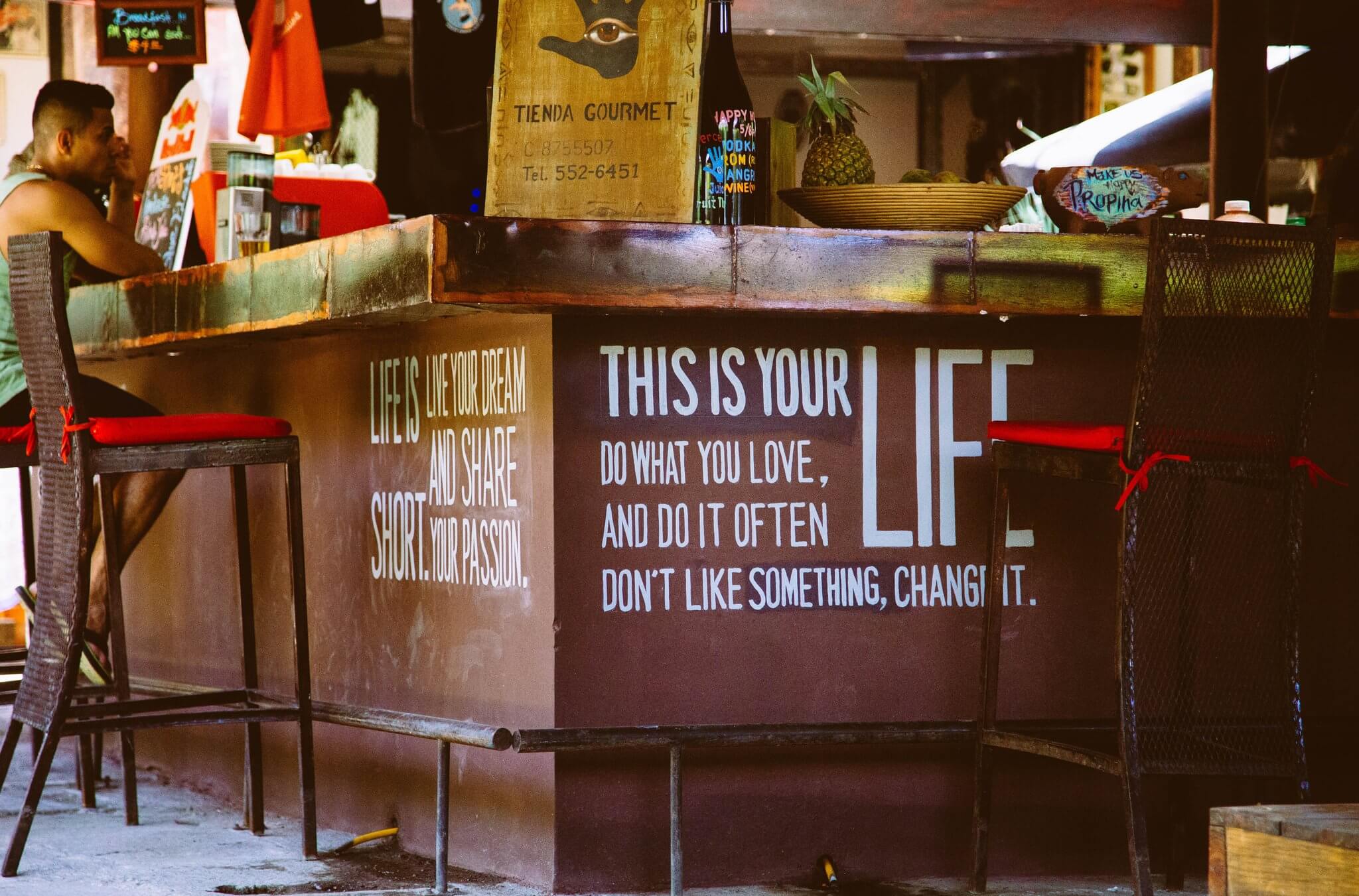 Words of wisdom and other bar art in Granada, Nicaragua